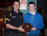 Paddy Richmond presents Ciaran Hardy with the Under 14 NA Hurling 